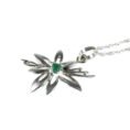 dije flor de plata y esmeralda