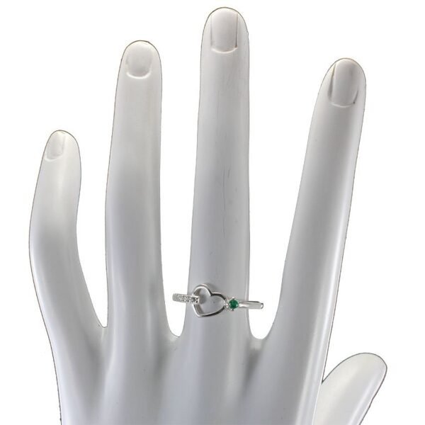 Vista lateral anillo lujo esmeralda