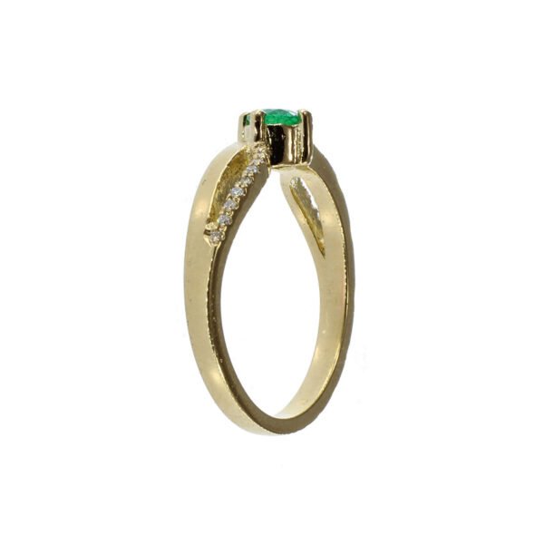 Anillo artesanal de oro 18k con esmeralda colombiana y diamantes Anillo de oro 18k con esmeralda colombiana natural y diamantes, joya artesanal de Bogotá lateral