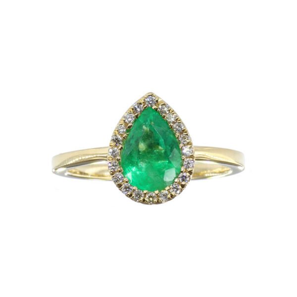Anillo de oro 18k con esmeralda colombiana y diamantes Anillo de oro 18k con esmeralda colombiana en forma de lágrima rodeada de diamantes naturales